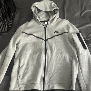 Grey Nike Tech, worn only once.